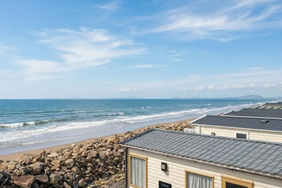 Caravans right on the beachfront of Barmouth at Lyons Sunnysands Holiday Park