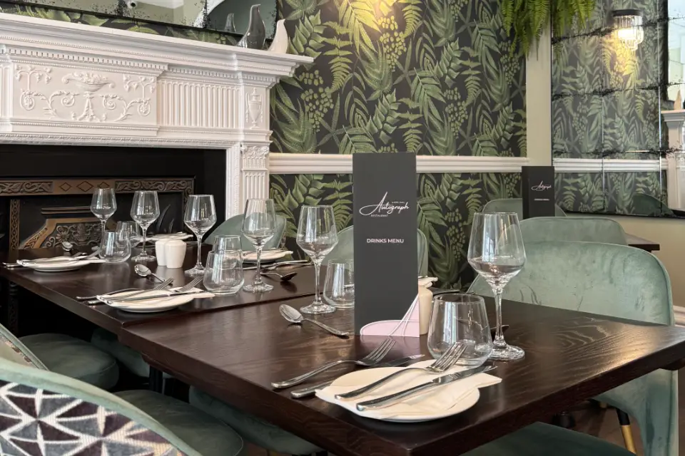 Young boy anjoying the sand art activity at Lyons Robin Hood' adventure den